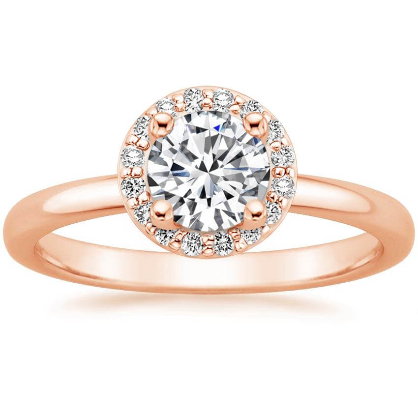 rose gold Halo engagement ring on white background