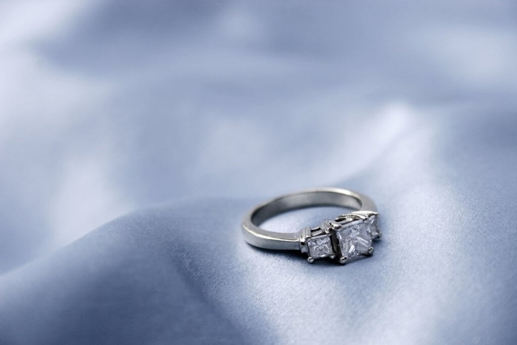 Three stone engagement ring